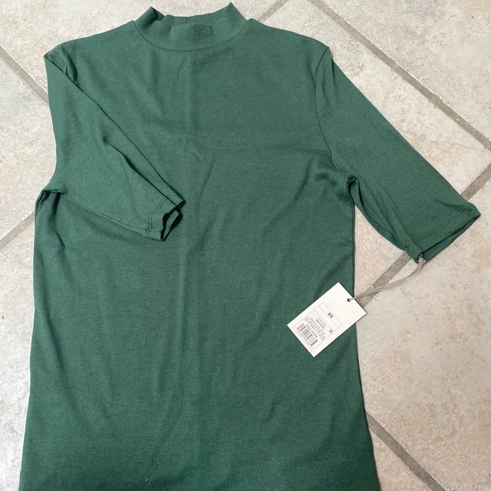 Green mid sleeve turtle neck brand new shirt